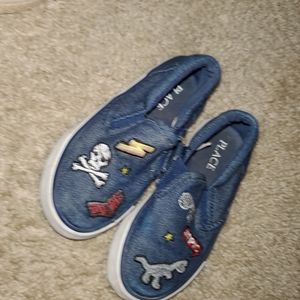 Dinosaur slip ons